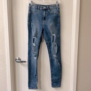 High waisted distressed jeans